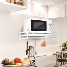 PRICES MAY VARY. ★【Sturdy Frame】 Made of carbon steel, processed by stoving paint, the bracket could hold up to 44 LB(20kg). ★【Compatible Dimension��】 Dimension of the shelving board is 22.5×14 inches(58×36 cm), support most household electric oven. ★【Wall Mount】 Give the flexibility to mounting better place other than table platforms, expansion anchors stabilize the rack firmly. ★【Life Assistant】 This bracket is aimed to save your valuable kitchen space and time in picking auxiliary cooking dinin Mount Microwave, Microwave Wall Mount, Hanging Microwave, Mounted Microwave, Microwave Oven Shelf, Microwave Shelf, Metal Shelving, Space Saving Kitchen, Kitchen Size