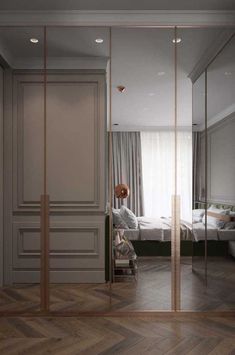 an empty bedroom with mirrored walls and wooden flooring is pictured in this rendering image