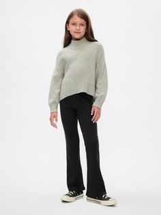 Soft, stretch ribbed knit flare leggings.  Elasticized waist.  Fit: Stretch-to-Fit.  A legging silhouette that hugs the waist, hip, and thigh.  Flared at the ankle. Black Flared Leggings, Ribbed Flares, Black Flare, Nightwear Women, Girls Leggings, Leggings Kids, Flare Leggings, Chunky Knitwear, Formal Shirts For Men