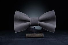 Stylish and fashionable accessory is great for so many occasions!Our bow ties are made with love from 100% Full Grain Leather, with adjustable neck strap.The mission of this accessory is to raise the mood and self-confidence of its owner, to give a sense of style!Material: 100% Full Grain LeatherColor: Stone Gray Design: minimalist  Style: unisexSize 🧔👩(ADULT):- 6x11 cm. (2.3x4.3")- strap is regulated;- the width of strap is 1.5 cm. (3/4").Size 👦👧(YOUTH):- 5x8 cm. (1.9x3.1")- strap is regula Wedding Bow Tie Groomsmen, Bow Tie Groomsmen, Groom Bowtie, Leather Bow Tie, Wedding Bow Tie, Groomsmen Bowtie, Personalized Bow, Tiny Bow, Bow Tie Wedding