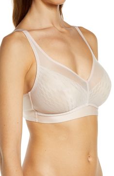 This lightweight yet powerful bra is designed to lift the bustline up to one inch while a wire-free band contours to your body so it never pinches or restrains. 55% nylon, 45% spandex Hand wash, line dry Imported Elegant Fitted Full Coverage Sports Bra, Elegant Full Coverage Bra With Light Support, Elegant Full Coverage Nursing Bra With Light Support, Feminine Full Coverage Bra With Medium Bust Support, Elegant Full Coverage Sports Bra With Built-in Bra, Elegant Push-up Sports Bra, Supportive Nylon Activewear, Bra Friendly, Beige Underwire Seamless Bra, Underwire Nylon Sports Bra With Built-in Bra