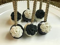 black and white cake pops decorated with flowers