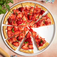 there is a pie with strawberries on it