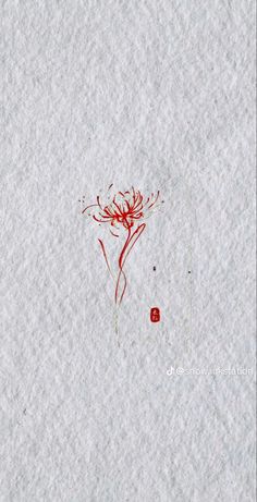 a red flower on white paper with chinese writing in the middle and an image of a plant behind it