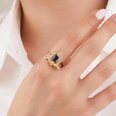 About this item Introducing the exquisite Emerald Cut Sapphire in Real Gold, designed to captivate with its stunning allure and timeless elegance. Crafted with utmost precision, this exquisite piece is perfect for those seeking a symbol of eternal love and commitment 𝐈𝐭𝐞𝐦 𝐃𝐞𝐭𝐚𝐢𝐥𝐬 * Gold KT: 10K, 14K, 18K * Custom Gold Color: Rose Gold, Yellow Gold, White Gold * Width of Band: 3.00MM * Thickness of Band: 1.22MM 𝐆𝐞𝐦𝐬𝐭𝐨𝐧𝐞 𝐃𝐞𝐭𝐚𝐢𝐥𝐬 * Sapphire * Total CTW: 0.47ctw WHY COSMIC FINE JEWELRY? ✓ Crafted with precision by skilled artisans with 10 years of experience in fine jewelry craftsmanship ✓ Uncompromising on quality to ensure customer satisfaction with every piece ✓ Exudes elegance and sophistication, perfect for special occasions or everyday wear ✓ Thoughtfully packag Gold Vintage Ring, Deco Blue, Ring Art Deco, Sapphire Engagement Ring, 18k Gold Ring, Ring Minimalist, Sapphire Engagement, Multi Stone Ring, Blue Gemstones