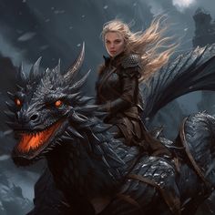 a woman riding on the back of a black dragon