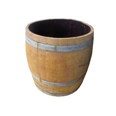 a wooden barrel is shown on a white background for use as a vase or planter