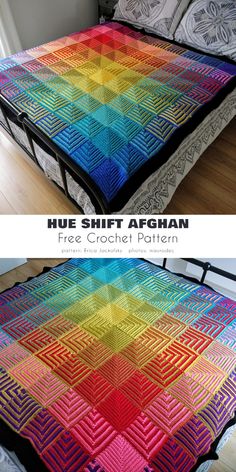 a bed with a colorful quilt on top of it and the bottom is made up