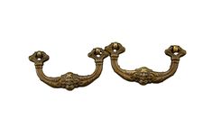 two antique brass door handles on white background