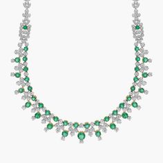 Set in 18k white and yellow gold, this incredible necklace features beautiful round emeralds and sparkling brilliant diamonds.  The perfect piece for your next big night out. Exquisite Green Necklace With Brilliant Cut, Luxury Green Diamond Necklace For Anniversary, Green Luxury Diamond Necklace For Anniversary, Luxury White Gold Emerald Diamond Necklace, Exquisite Green Emerald Necklace With Brilliant Cut, Luxury Green Diamond Necklace With Single Cut Diamonds, Fine Jewelry Green Diamond Necklace With Brilliant Cut, Exquisite Green Diamond Necklace With Accents, Fine Green Diamond Necklace