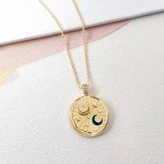 DescriptionThe Sun and Moon Pendant Necklace features: Pendant with sun, moon and stars Stone insets Fine and elegant Size18" chain3/4" pendant Material18k gold plated Sun And Moon Pendant, Wanderlust And Co, Sun Moon And Stars, The Sun And Moon, Sun Charm, Moon Pendant Necklace, Wear Necklaces, Moon Jewelry, Moon And Stars