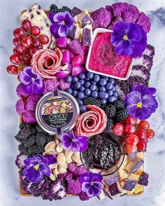 a platter filled with assorted fruits and vegetables