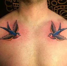 a man with two birds on his chest