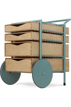 a wooden cart with drawers and wheels on the front is shown in this image, it appears to be made from plywood