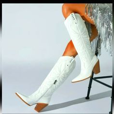 Brand New Women's White Western Pointed Toe With Vibrant Embroidery Knee High Block Heel Cowboy Boots. These Are Brand New And Feature A More Snug Fit To Your Legs, Which Is Super Flattering! They Don't Gape On Your Legs Or Look Too Big On Your Legs, Like Other Cowboy Boots. They Have A Slimmer Fit. Size 9. Never Worn! Knee High Boots Tall Cowboy Boots Fitted Boots Fitted Cowboy Boots Narrow Leg Fitted Leg Narrow Fit Cowboy Boots Heeled Heeled Cowboy Boots Knee Length Western Boots Rodeo Cowgirl Fitted Boots, Boots Knee Length, Tall Cowboy Boots, Heeled Cowboy Boots, High Heel Cowboy Boots, Heel Cowboy Boots, Western Riding Boots, Trendy Block Heels, Black Heeled Ankle Boots