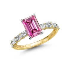 a pink tourmaline ring with baguets and diamonds on the band, set in yellow gold