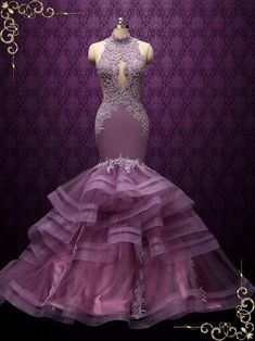 a purple dress is displayed on a mannequinl dummyt in front of a purple background