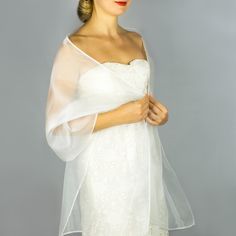 A very elegant organza shawl for your wedding party or evening dress. Made of luxury organza, slightly sparkles on the sun or light. Color: white ( other colors are available ) Size : 200 cm x 45 cm You can use it as a wrap, shawl or stola. WE accept credit cards! Sheer Organza Veil For Party, Sheer Organza Party Veil, Sheer Fitted Elegant Tulle Fabric, Elegant White Evening Veil, Elegant Sheer Organza Veil, Elegant Fitted Sheer Veil, Elegant Sheer Fitted Veil, Elegant White Tulle Fabric For Party, Elegant White Formal Veil