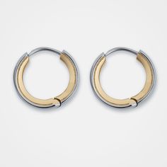 The Arc is a set of minimalistic hoop earrings with laser-etched linework accenting the beveled interior. Opens via a hidden hinging mechanism. Materials: Stainless Steel Steel Accessories, Stainless Steel Accessories, Laser Etching, Earings Piercings, Accessories Design, Mens Jewelry, Hoop Earrings, Stainless Steel, Gold