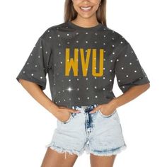 Get ready to cheer on the West Virginia Mountaineers with this sparkly and spirited Go Time Rhinestone Crop T-Shirt from Gameday Couture. Its mid-length crop design offers a flattering and trendy look, perfect for showcasing your game day style. The 100% cotton construction ensures a soft and breathable feel, keeping you comfortable all day long. Brand: Gameday Couture; Imported; Machine wash; Material: 100% Cotton; Mid-length crop; Officially licensed; Rhinestone embellishment allover; Screen print graphics; Short sleeve. | Gameday Couture Women's NCAA West Virginia Mountaineers Go Time Rhinestone Crop T-Shirt, Gray, XXL Dance Apparel, Gameday Couture, Team Jackets, Virginia Tech Hokies, West Virginia Mountaineer, Virginia Tech, Crop T Shirt, Crop Tshirt, Fit Style