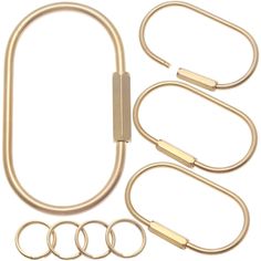 an assortment of brass colored metal rings and hooks