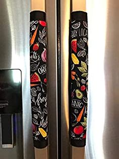 the refrigerator door is decorated with an assortment of fruits and veggies on it