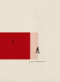 two people walking in front of a red wall with one person on the other side