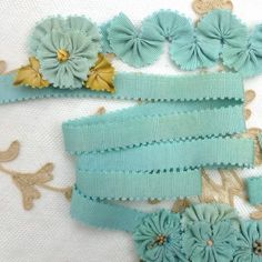 several pieces of fabric with flowers on them