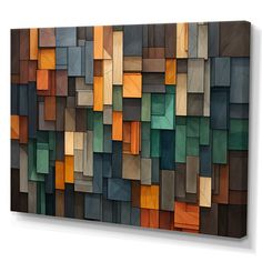 an abstract wooden wall art piece with many different colors and shapes on it's surface