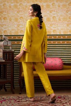 Yellow bell sleeves front open top with padma bloom applique and sequin embellishments detailing. Paired with a straight pant and an inner. - Aza Fashions Spring Festive Palazzo Set With Set-in Sleeves, Traditional Festive Pant Set With Set-in Sleeves, Festive Silk Sets With Set-in Sleeves, Silk Sets With Set-in Sleeves For Festive Occasions, Floral Embroidery Pant Set For Eid Party, Eid Party Pant Set With Floral Embroidery, Festive Palazzo Set With Set-in Sleeves For Eid, Festive Silk Palazzo Set With Set-in Sleeves, Traditional Designer Sets With Set-in Sleeves