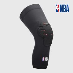 the back of a black knee brace with red dots on it and an image of a basketball