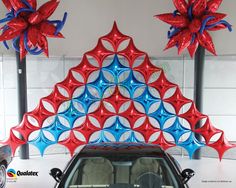 the car is decorated with red, white and blue decorations