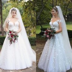 two women in wedding gowns, one wearing a veil and the other with flowers