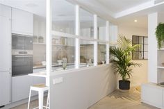 the kitchen is clean and ready to be used as a living room or dining area