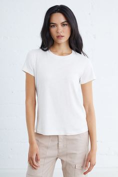 The Melrose Tee is an essential addition to any wardrobe, boasting a soft fabric that provides comfort and style. Featuring a center back seam and triangle insets at the hem, this shirt offers a perfect fit for all body types. Upgrade your t-shirt game with the Melrose Tee. 100% Cotton Models are 5'8" and wearing a size small Short Vest, Sweater Jumpsuit, Casual Summer Tops, Clear Sky, Cropped Tube Top, Casual Tops For Women, Asymmetrical Tops, Dressy Tops, Romper Dress