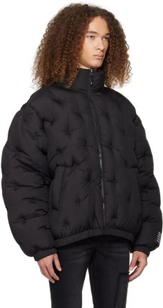 Insulated quilted polyester taffeta puffer jacket. Logo embroidered throughout. Reverse in black polyester taffeta. Logo graphic pattern printed throughout. · Stand collar · Zip closure · Welt pockets · Bungee-style drawstring at elasticized hem · Logo patch at elasticized cuffs · Welt pockets at interior Supplier color: Black Nike Nocta Puffer Jacket, Streetwear Quilted Nylon Puffer Jacket, Streetwear Quilted Nylon Jacket With Padded Collar, Quilted Nylon Puffer Jacket For Streetwear, Streetwear Nylon Quilted Puffer Jacket, Nike Nocta Puffer, Reversible Puffer Jacket, Mens Outerwear, Graphic Patterns