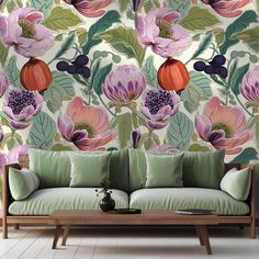 a living room scene with focus on the sofa and floral wallpapers that are in full bloom