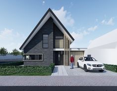 a white car is parked in front of a house with a black and white roof