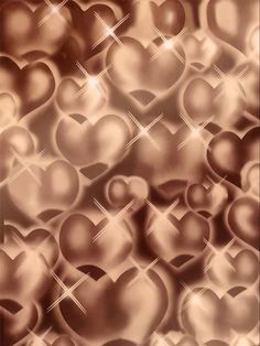 an abstract background with many shiny hearts