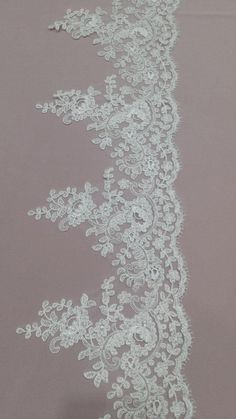 Ideal for accessories, wedding dresses, veils.Very impressive and elegant.Item: EVSL019CColours: cream, ivoryStyle: SpanishWidth: 22 cm, shown for one meter (100 cm x 22 cm)It is sold per meter.If you need any other measures, please contact us.*Great trade acceptable!We ship from Latvia (EU) worldwide via Priority mail (with the Latvian Post).Estimated delivery time:USA / Canada: 7-10 business daysEurope: 3-7 business daysAustralia: up to 30 daysOther countries: up to 30 days.Attention!STANDARD Bridal Gown Lace, Garter Lace, Lace Inspiration, Golden Lace, Veil Lace, Lace Veil, Alencon Lace, Lace Veils, Lace Garter