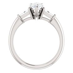 This attractive diamond engagement ring boasts a graceful design. Its gorgeous appeal focuses your eyes on a glittering pear cut diamond with a weight of 2.00 carats. This diamond is certified by GIA laboratory and has a clarity of SI1 which is %100 clean to the naked eye with a color grade of E. Complementing the center diamond and are baguette cut diamonds that glistens with perfection. Metal : 14K Gold, 18K Gold or Platinum Setting Type : Prong NO. of Stones : 3 Total Carat : 2.40 Carats Type Baguette Engagement Ring, Pear Diamond Rings, Gia Certificate, Three Stone Diamond Ring, Three Stone Diamond, Pear Cut Diamond, Pear Engagement Ring, Baguette Cut Diamond, Pear Diamond