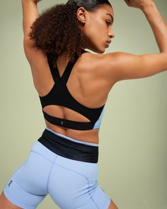 This sports bra with built-in padding provides medium to high support and plenty of sweat-wicking. For sprints, HIIT and anything with a bit of bounce. With light padding, stay supported for all your medium to high-impact activities. Choose to wear it on its own or as a comfy layer, the high neckline is not only on-trend, but gives you added coverage. We’ve used technical fabric throughout the Performance Bra to wick sweat away from your skin as fast as possible. And, at the back, we've added a Recycled Polyester Sports Bra With Built-in Padding For Training, Versatile Sports Bra With Medium Support, Versatile Medium Support Sports Bra, Supportive Sports Bra With Built-in Padding For Light Exercise, Sporty Recycled Polyester Racerback Sports Bra, Sporty Racerback Sports Bra In Recycled Polyester, Sporty Compression Bra For Training, Sporty Compressive Training Bra, Light Support Racerback Sports Bra In Recycled Polyester