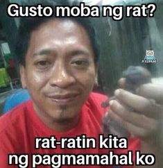 a man holding a cell phone in his right hand and the caption says, guso moba ng rat? rat ratn kita ng ng ng ng ng ng ng ng ng ng ng ng ng ng ng ng ng ng ng ng ng ng ng ng ng ng ng ng