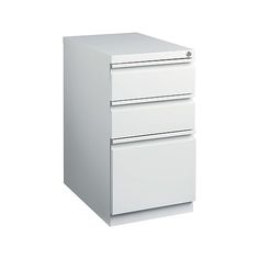 a white filing cabinet with three drawers