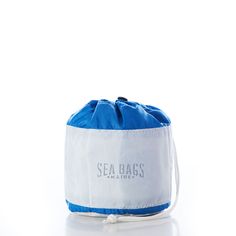 a blue and white bag with the sea bags logo on it's front side