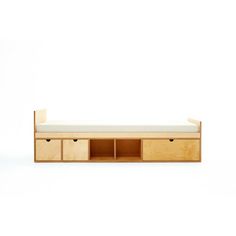 a wooden bench with drawers underneath it on a white background in front of a wall