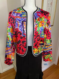 Beautifully made and such vibrant colors. This vintage NahNah Collections Jacket by Jonathan Tait is in excellent vintage condition and will be a fabulous addition to any event any time of the year. Pair this sequined trimmed fully lined jacket with a black skirt or flowy pants. * Bust 38" * sleeve 22.5" * length from back collar seam to hem 19" Retro Colorful Spring Outerwear, Colorful Retro Spring Outerwear, Vintage Multicolor Outerwear For Spring, Vintage Multicolor Spring Outerwear, Flowy Pants, Womens Blazers, Black Skirt, Time Of The Year, Minneapolis