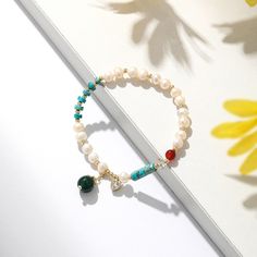 Bohemian Jewelry,This Natural Freshwater Pearl Color Matching Agate Turquoise Bracelet is perfect for any occasion. With its minimalistic design, it is the perfect way to make a subtle statement without being too over the top.This delicate beaded bracelet features a combination of natural freshwater pearl and agate turquoise stones. The bracelet is adjustable and can be tailored to fit any size. Perfect for those who want to keep their jewelry minimalistic yet make a stylish statement. This brac Turquoise Stones, Minimalistic Design, Nature Bracelets, Spiritual Jewelry, Pearl Color, Over The Top, American Express, Natural Pearls, Heart Charm Bracelet