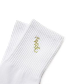 Classic crew socks with a clean emblem embroidery. One size fits most. 90% Cotton 5% Polyester 5% Lycra Affordable White Socks With Letter Print, Emblem Embroidery, Crew Socks, Violet, Socks, Embroidery