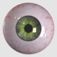 an eyeball with green eyes is shown in this image